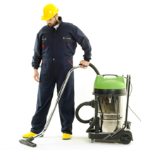 Man using commercial vacuum cleaner